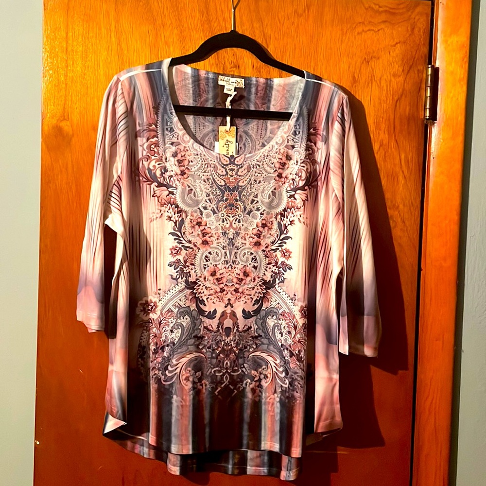 2xl ladies top. Shades of pink with gray. Never been worn. Tags still attached.